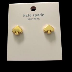 NWT. Gold Kate Spade logo earrings. Comes with signature pink pouch.